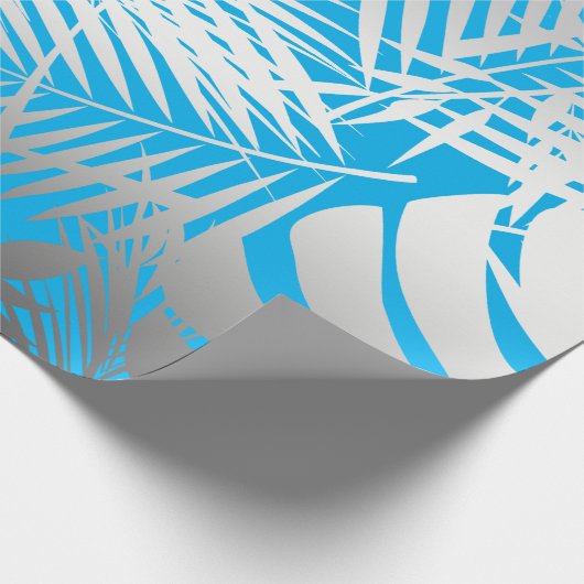 Silver tropisch bladpatroon op blauw oerwoud cadeaupapier (Hoek)