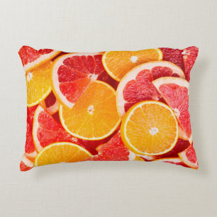 Sinaasappel- en grapefruitachtergrond, vers, rijp accent kussen