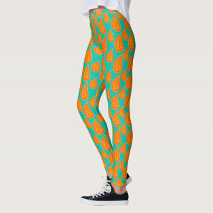 Sinaasappel en tel-groen abstract bladpatroon leggings