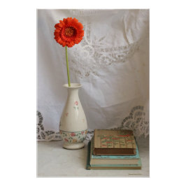 Sinaasappel gerbera en boeken poster perfect poster