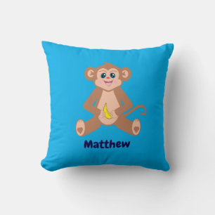 Singe sur un coussin bleu azur