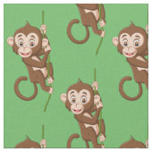 Singe sur un tissu de design viticole (Fermer)