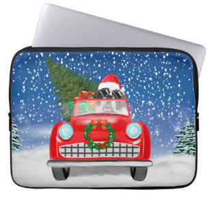 Sint Bernardhond rijdt auto in sneeuw met Kerst Laptop Sleeve