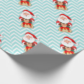 Sinterklaas in rode pyjama's met een mok cadeaupapier (Hoek)