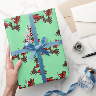 Sinterklaas met sluw groen cadeaupapier