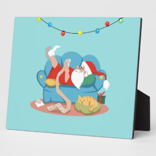Sinterklaas op de bank in pyjama fotoplaat