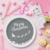 Sinters slee silhouette die boven de huizen vliegt papieren bordje (Feest)