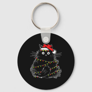 Sinterzwarte kat omhoog gedraaid in kerstboomverli sleutelhanger