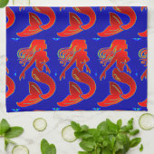 sirènes rouges sur serviette de cuisine bleue (Plié)