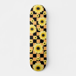 Skateboard à damiers et tournesol orange et noir