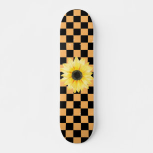 Skateboard à damiers et tournesol orange et noir