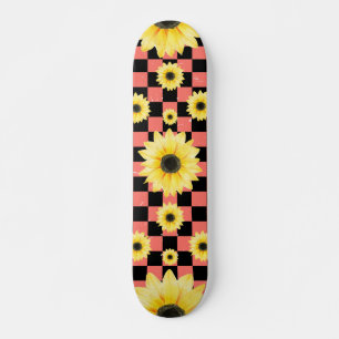 Skateboard à damiers et tournesol rose et noir