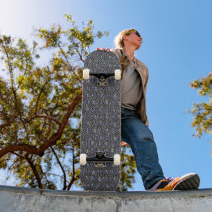 Skateboard Arrosage sur métal gris bleu