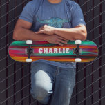 Skateboard Coloré Abstrait Moderne Grilles Nom personnalisé<br><div class="desc">Colorful Abstrait Modern Stripes Custom Name Skateboard vous propose votre nom personnalisé dans la typographie moderne sur un arrière - plan rayé coloré. Personnalisez en modifiant le texte dans la zone de texte fournie. Offrez un cadeau sur mesure, un skateboard personnalisé à votre skateboarder préféré pour Noël, anniversaire ou votre...</div>