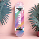 Skateboard Coloré brillant Rainbow Pride Motif Floral rose<br><div class="desc">Libérez vos vraies couleurs grâce à notre design de patinage dynamique! Célébrez l'expression de soi et embrassez votre individualité avec notre motif de fierté arc-en-ciel accrocheur, floraux florissants, et touches personnalisées. Que vous soyez un passionné de patinage ou un passionné d'art, ce tableau est la toile ultime pour présenter votre...</div>