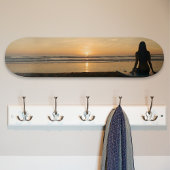 Skateboard Coucher de soleil sur une plage tranquille