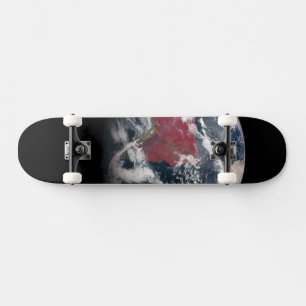 Skateboard Croissance plante Sur La Planète Terre.