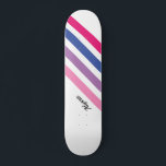 Skateboard Fille personnalisée rose rayé<br><div class="desc">Cette planche à roulettes est décorée de rayures audacieuses de rose,  violet,  bleu et blanc avec typographie noire. Customisez-le en changeant le nom ou en le transformant en monogramme à la place.</div>