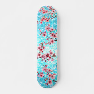 Skateboard Fleur de cerisier flottant sur l'océan