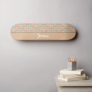 Skateboard Fleurs blanches gravées sur bronze