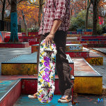 Skateboard Graffiti en néon avec la devise "Live to Ride" vio<br><div class="desc">Ce jeu de skateboard éclate de couleurs vives, avec des éclats de néon rose, jaune, bleu et vert sur fond blanc. Au centre, la devise violette audacieuse "Live to Ride" se démarque, capturant parfaitement l'esprit libre et énergique de la culture du patinage. Le design d'inspiration graffiti, avec des touches dynamiques...</div>