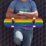 Skateboard LGBT Gay pride Rainbow Stripes drapeau Monogram LG<br><div class="desc">Belle, vibrante, LGBT gay pride couleurs arc-en-ciel couleurs, bandes géométriques colorées motif, personnalisées, personnalisées, élégant faux script / typographie / police, moderne, cool, élégant, la meilleure qualité de la compétition d'érable hard-rock en forme de skateboard deck. Pour customiser, il suffit de taper votre nom / monogramme / initiales. Pendant que...</div>