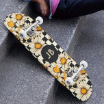 Skateboard Monogram Retro Groovy Daisy Checkerboard<br><div class="desc">Monogram Retro Groovy Daisy Checkerboard Skateboard features a groovy daisy pattern on a black and white checkerboard pattern background with your custom text or personalized initials in the center. Perfect as a gift for family and friends for Christmas,  birthday,  holidays,  work colleagues and more. Created by ©Evco Studio www.zazzle.com/store/evcostudio</div>
