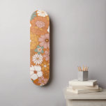 Skateboard Orange Retro Style Floral Motif Hippie Boho les an<br><div class="desc">Ce skateboard cool avec les années 70 style floral cool ferait un cadeau merveilleux pour quelqu'un,  qui aime tout rétro!</div>