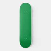 Skateboard un arrière - plan vert avec une bordure blanche (Recto)