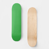 Skateboard un arrière - plan vert avec une bordure blanche (Recto)