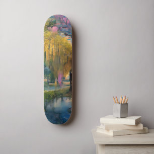 Skateboard Willow d'or au coucher du soleil près de l'étang