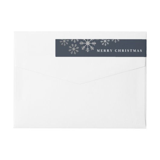 Skatteuse sneeuwomslag rond het etiket van het ter (Achterkant)