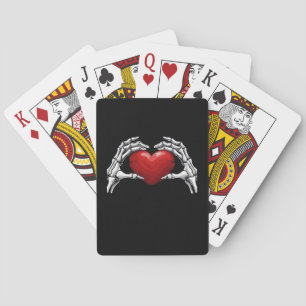 Skelet handen houden een Red Heart Design Classic Pokerkaarten