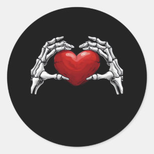 Skelet handen houden een Red Heart Design Classic Ronde Sticker