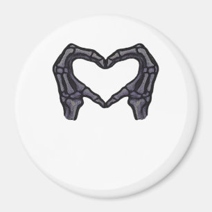 Skelet handen vormen een hart magneet