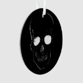 Skeletkop met gloeiende ogen op een ornament (voorkant)