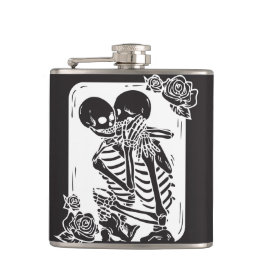 Skeletkoppel op een heupfles