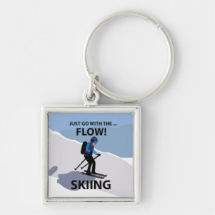 Skiën gaat gewoon met de flow skiën sleutelhanger