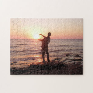 Skippende stenen in de Sunset Puzzle Legpuzzel