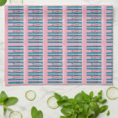 Skis bleu sur serviette de cuisine rose (Plié)