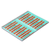 Skis rouges sur carnet bleu (Côté gauche)