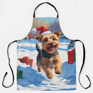 Skye Terrier Rent in de Sneeuw met Kerstmuts Schort