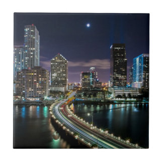 Skyline of Miami city with bridge at night Tegeltje