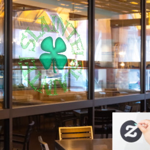 Slainte grote zie door venster vastklampen achters raamsticker