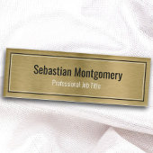 Slank, geborsteld goud met metalen chassis naambadge