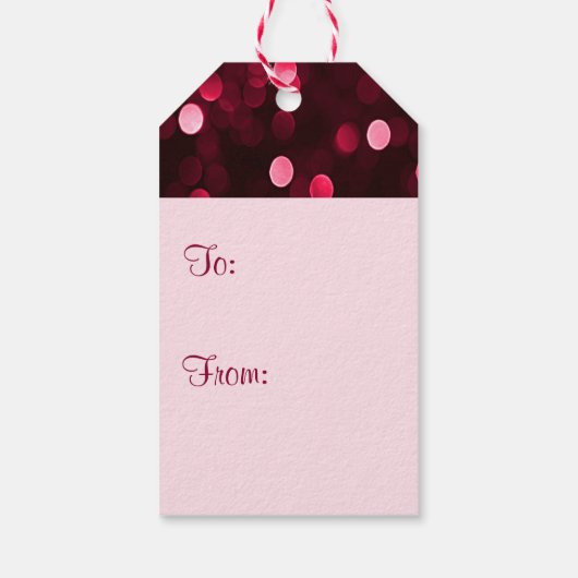 Slankerend kerstfeest met rode kerstlampjes Bokeh  Cadeaulabel (Achterkant)