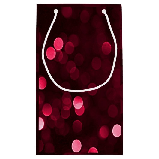 Slankerend kerstfeest met rode kerstlampjes Bokeh Klein Cadeauzakje (Achterkant)