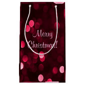 Slankerend kerstfeest met rode kerstlampjes Bokeh Klein Cadeauzakje (Voorkant)