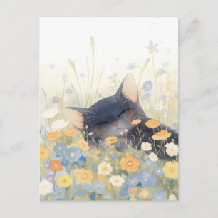 Slapend zwart katje in weide met wilde bloemen briefkaart