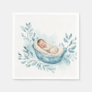 Slapende baby in blauwe wieg servet